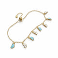 Amara Charm Bracelet in yellow gold – angled view