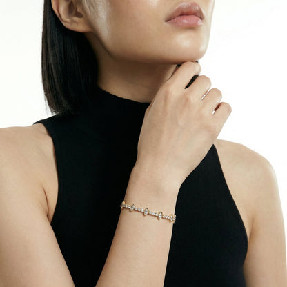 ZORÁE Core Apex 18K yellow gold bracelet worn on model