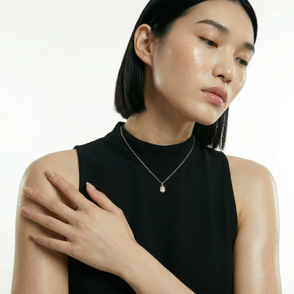 ZORÁE Core Frame 18K yellow gold necklace worn on model