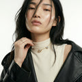 ZORÁE Unbound 07 18K yellow gold necklace worn on model