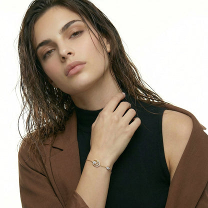 ZORÁE Unbound 11 18K yellow gold bracelet worn on model